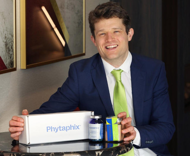 Dr Conor Kerley flying Louth flag at National Enterprise awards - Phytaphix founder, Dr. Conor Kerley, featured in Dundalk Democrat newspaper