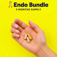 Endo Bundle: the daily dose in a hand, two Lipoic Acid Phix capsules and one Gold Standard Curcumin capsule