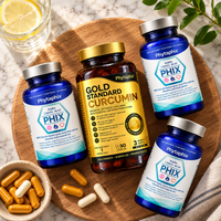 Endo Bundle Gold: Gold Standard Curcumin and three bottles of Lipoic Acid Phix laid on a wooden board